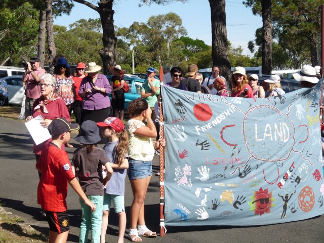  People with banner at the Appin Massacre Memorial, 2013